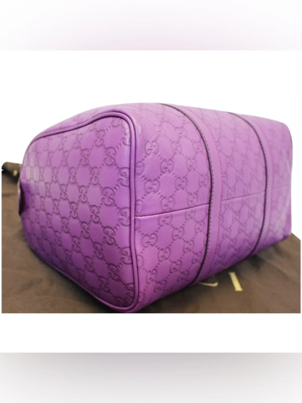 Gucci embossed leather
